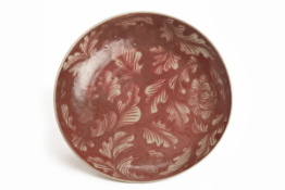 AN UNDERGLAZE COPPER-RED CHARGER