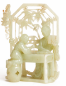 A CARVED JADE SCULPTURE OF A MOTHER AND CHILD