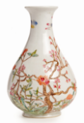 A FAMILLE ROSE 'PEACH AND PRUNUS' PEAR-SHAPED VASE
