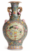 A TWIN HANDLED FAMILLE ROSE BOTTLE VASE