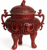 A CINNABAR LACQUER TWIN HANDLED CENSER AND COVER