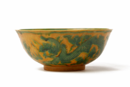 A GREEN AND YELLOW GLAZED INCISED PORCELAIN BOWL