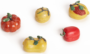 A SET OF FIVE 'TROMPE L'OEIL' PORCELAIN FRUIT CONCEALING EROTIC SCENES