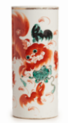 A PORCELAIN TUBULAR VASE, FEATURING CHINESE LIONS