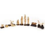 A GROUP OF ASSORTED IVORY CARVINGS