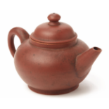 A SPHERICAL YIXING POTTERY TEAPOT