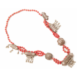 A BEDOUIN JEWISH WHITE METAL AND RED BEAD NECKLACE