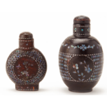 A SET OF TWO LAC BURGAUTE SNUFF BOTTLES