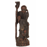 A LARGE CARVED WOOD FIGURE OF AN IMMORTAL