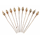 A SET OF TEN BRASS AND JADE HAIRPINS