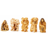 FIVE CARVED IVORY FIGURES DEPICTING MYTHICAL SCENES