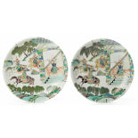 A PAIR OF FAMILLE VERTE PORCELAIN CHARGERS