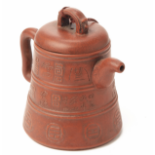 A MOULDED AND INSCRIBED YIXING POTTERY TEAPOT