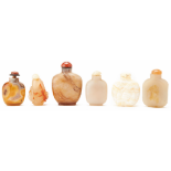 A SET OF SIX CARVED STONE SNUFF BOTTLES