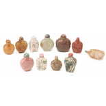 A SET OF ELEVEN STONE CARVED SNUFF BOTTLES
