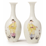 A PAIR OF SMALL CHINESE FAMILLE ROSE BOTTLE VASES