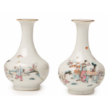 A PAIR OF CHINESE FAMILLE ROSE BALUSTER VASES AND A SLEEVE VASE