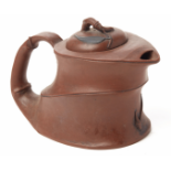 A NATURALISTIC YIXING POTTERY TEAPOT