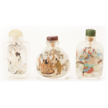 A SET OF THREE PAINTED GLASS SNUFF BOTTLES