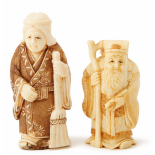 A SET OF TWO IVORY STANDING FIGURINES