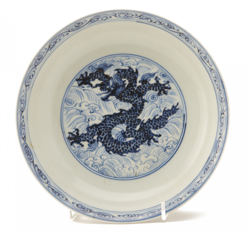 A BLUE AND WHITE DRAGON DISH