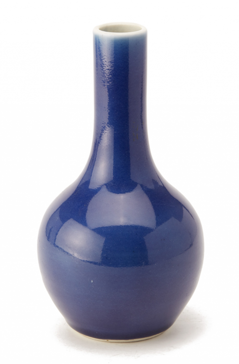 A BLUE MONOCHROME BOTTLE VASE