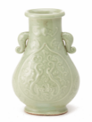 A TWIN-HANDLED CELADON BALUSTER VASE