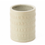 A CELADON GLAZED CALLIGRAPHY BRUSH POT