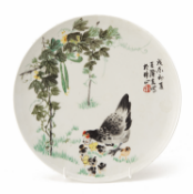 A PORCELAIN DISH FEATURING A HEN AND CHICKS