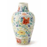 A DOUCAI BALUSTER VASE WITH FLOWERS