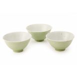 THREE GREEN GLAZED PORCELAIN BOWLS