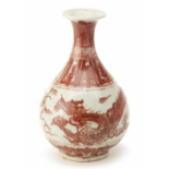AN UNDERGLAZE COPPER RED PEAR SHAPED DRAGON VASE