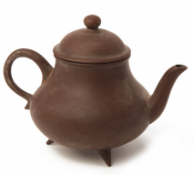 A BRONZE TRIPOD MINIATURE TEAPOT