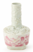 A MOULDED AND PAINTED CELADON BOTTLE VASE