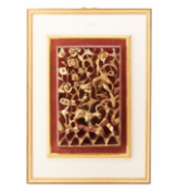 A CARVED GILT WOOD DECORATIVE PANEL, IN A FRAME