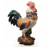 A LARGE POTTERY MODEL OF A COCKEREL