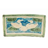 A CIZHOU SANCAI-GLAZED PILLOW FEATURING DUCKS