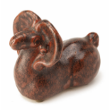 A GLAZED POTTERY MODEL OF A RAM