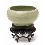 A CELADON ALMS BOWL