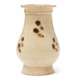 A SMALL HU-SHAPED IRON SPOT QINGBAI-GLAZED VASE