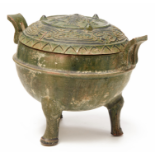 A GREEN-GLAZED TRIPOD CENSER AND COVER