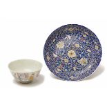 A FAMILLE ROSE BOWL AND A FLORAL ENAMELLED DISH