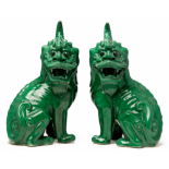 A PAIR OF GREEN-GLAZED MYTHICAL BEASTS
