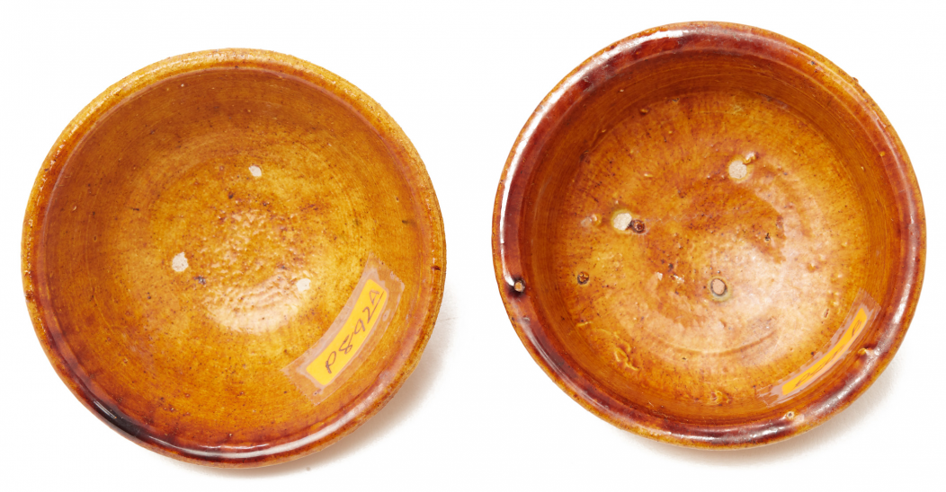 A PAIR OF SMALL YELLOW-GLAZED BOWLS