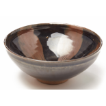 A HENAN RUSSET SPLASHED BLACK-GLAZED POTTERY BOWL