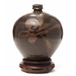 A HENAN RUSSET-PAINTED GLOBULAR JAR