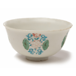 A SMALL ENAMELLED WHITE GLAZED BOWL