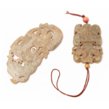 TWO CARVED JADE PLAQUES / PENDANTS