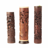 A GROUP OF THREE CARVED BAMBOO INCENSE HOLDERS