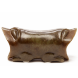 A LARGE JADE ANIMAL-SHAPED PILLOW